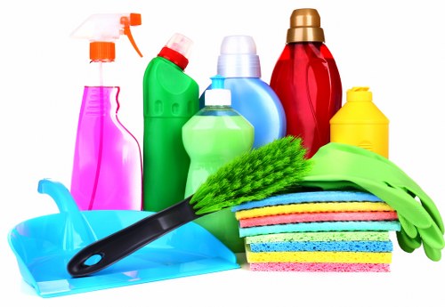 Staff member checking a carpet cleaning workspace for hazards