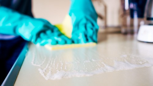 Senior staff member reviewing a carpet cleaning complaint response
